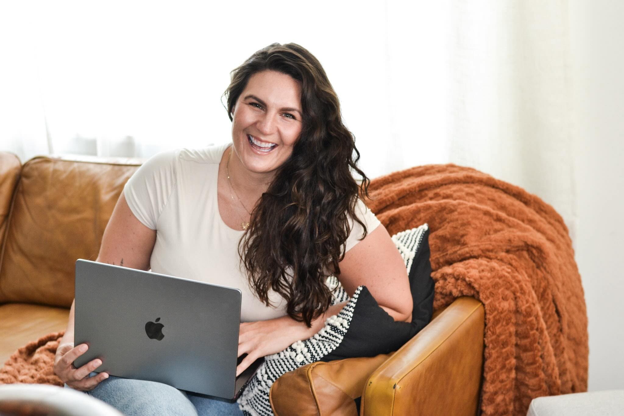 Alana Kane working on her laptop